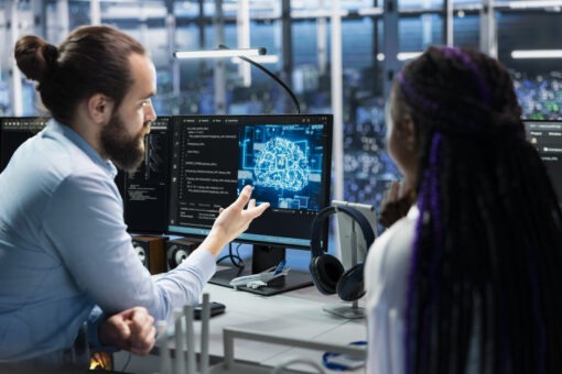 Data center programmers collaborating, working on neural networks AI databases